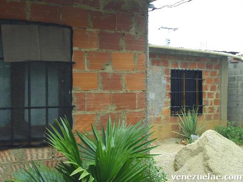 Vendo terreno con casa