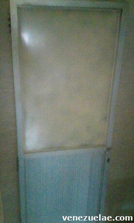 Puerta inoxidable