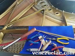 Si de pianos se trata : contacte a Servipianos C. A.