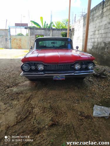 Se vende o se cambia oldsmobile 1959 con aire acondicionado